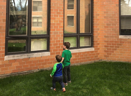 Emily’s sons visiting their great-grandparents at their independent living community in Wilmette.